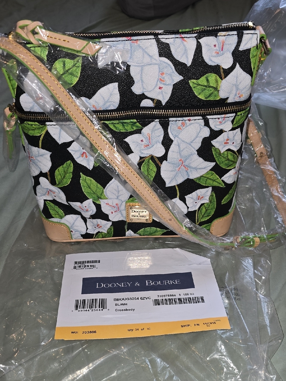 Dooney & Bourke Black Floral Crossbody with White Blossoms and Green Leaves